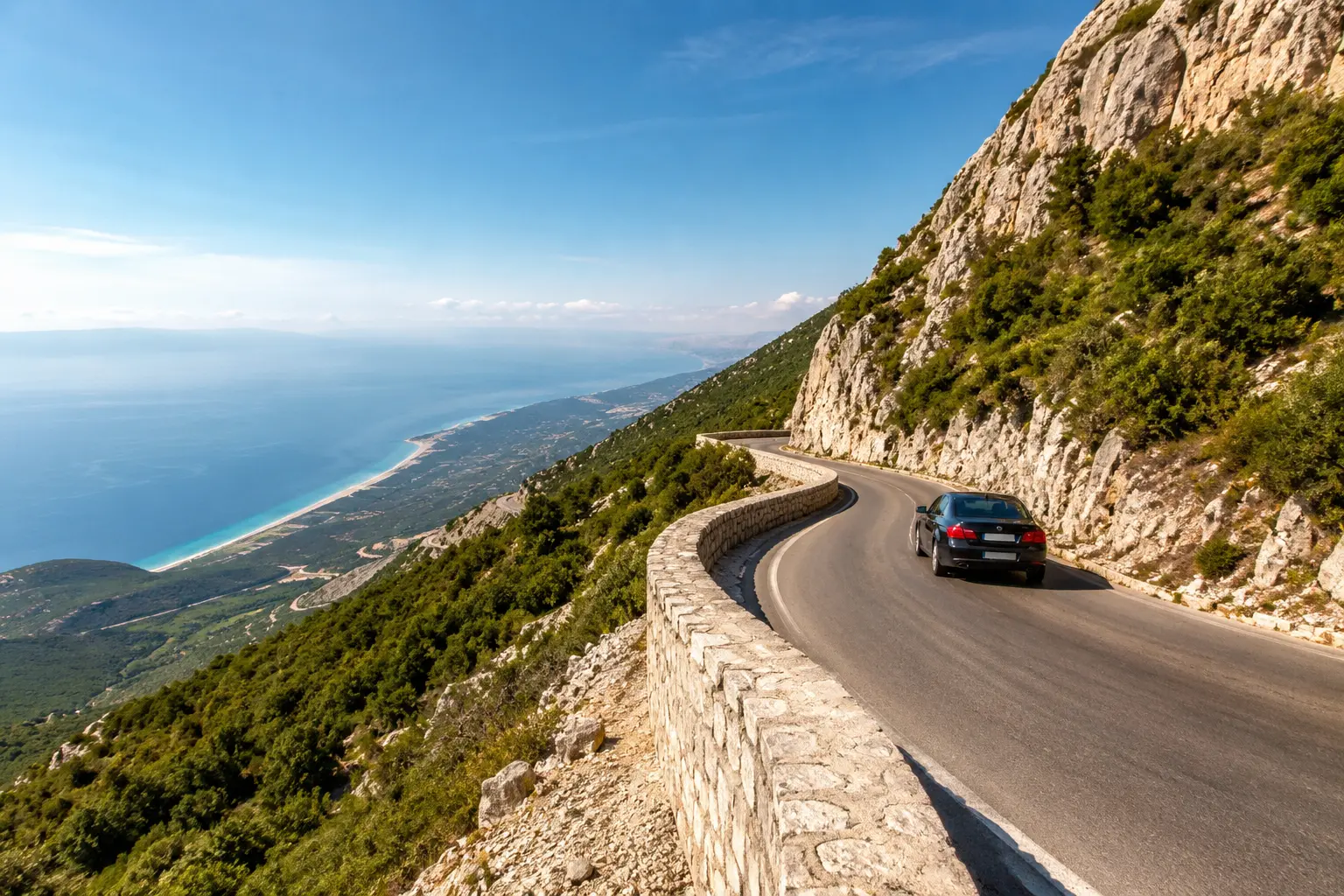 Car driving on the Llogara Pass road in Albania